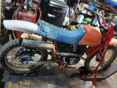 This 1985 Honda 100R is a classic, project-condition motocross motorcycle ready for your restoration...