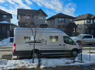 THIS IS A 2016 FORD TRANSIT cargo van converted to a camper. High roof with fix bed and a large spac...