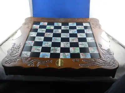Chess Board oriental motifs, has two drawers for the pieces, in excellent condition
