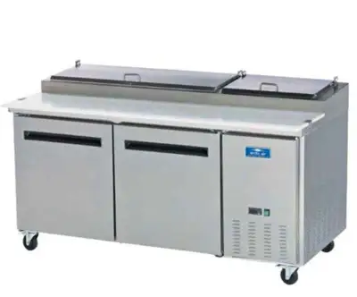 You are viewing a brand new Open Box 2 Door Solid SS Pizza Prep Table Cooler. This pricing is based...
