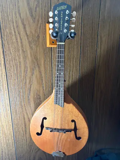 Gretsch New Yorker Mandolin with soft case and leather strap. $250.00 OBO I’m open to reasonable off...