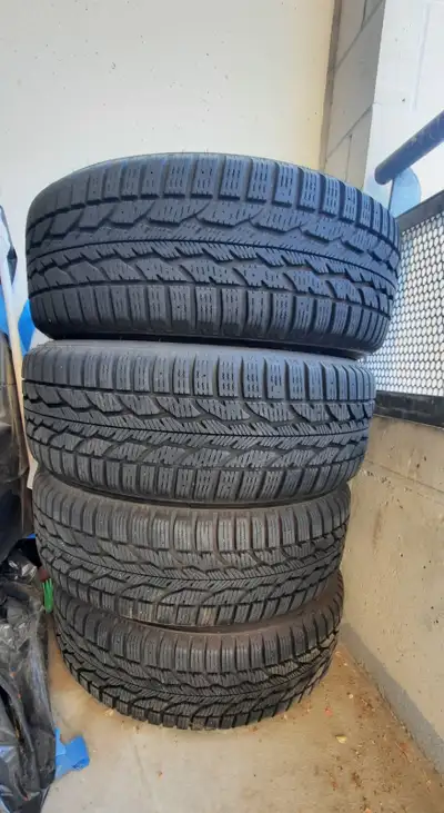 Winter Force 2 Firestone Tire with rims . Used for 2 Winters