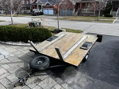 Carries two motorcycles, comes with folding ramp. $500 OBO