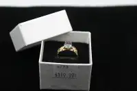10 KT Yellow Gold Ring with an oval-shaped rainbow stone.(#4773)