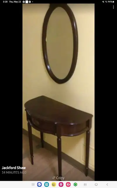 Table and Mirror set. Table is 31 1/2" wide x 30" high. Mirror is 34" long x 19" wide. selling it fo...