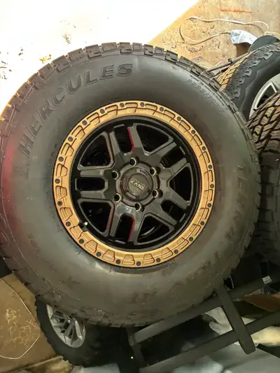 Brand new Set of 5 Hercules Terra Trac AT Tires on black and bronze Envy 17" rims. They are 6 bolt d...