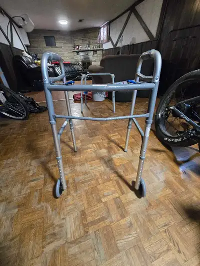 Walker and commode. Walker used for a month and commode never used. Must pick up