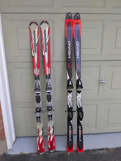 Two alpine/downhill skis (1.7m & 1.6m): $50 each