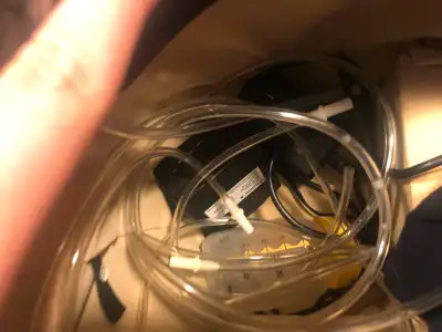 Breast pump with me nursing bra and a pack of nursing pads as well as puno with all attachments and...