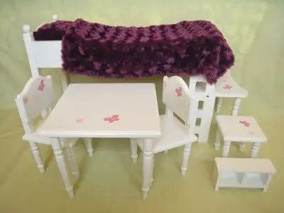 Set consists of a loft bed, table, 2 chairs with backs, one without and a TV stand. There is also a...