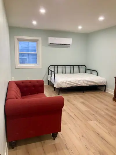 Fully furnished Bachelor apartment on the lower level of a quiet commercial and residential split pr...