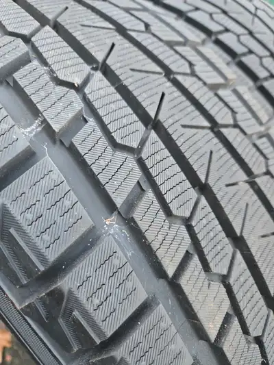 Like new Yokohama Iceguard GO75 245 60 R18 Retails at $300+ . Asking $325 for 2 tires.