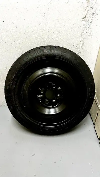 Brand new Good Year spare tire with jack. T115/70 D14. Inflatable to 60 psi (or 420 kpa). Fits a maj...