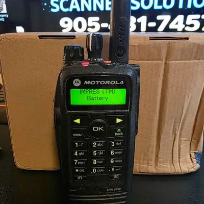 Xpr 6550 uhf comes with impress battery and charger $250.00 programmed