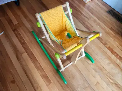 Wooden baby rocker. Missing the animal head on the front. Scratches on the bottom green rocker. Pick...