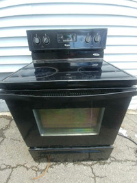 Whirlpool ceramic top electric stove. Self cleaning, self steam