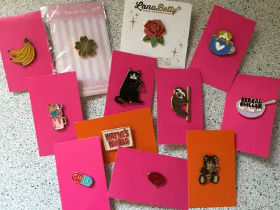 11 enamel pins, View more