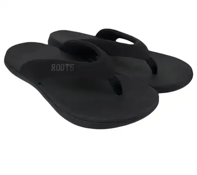 These are a new pair of Roots flip flops, perfect for summer! The flip flops are black and have the...