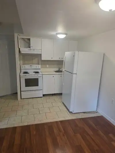 This cozy and clean one bedroom apartment features modern laminate flooring throughout, providing a...