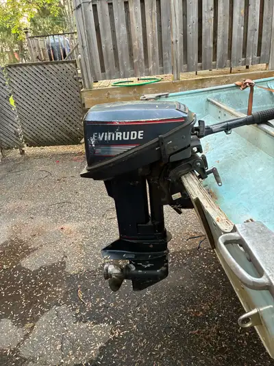 16 foot smoker craft with trailer and 15 hp evinrude two stroke out board for sale I do have muffs i...
