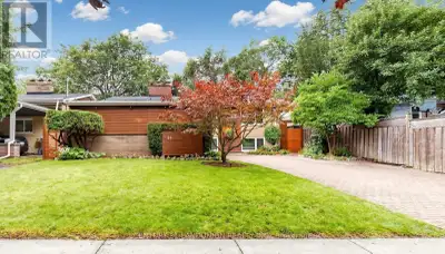 A Rare Gem! Nestled against a beautiful ravine area, this exceptional property offers stunning priva...