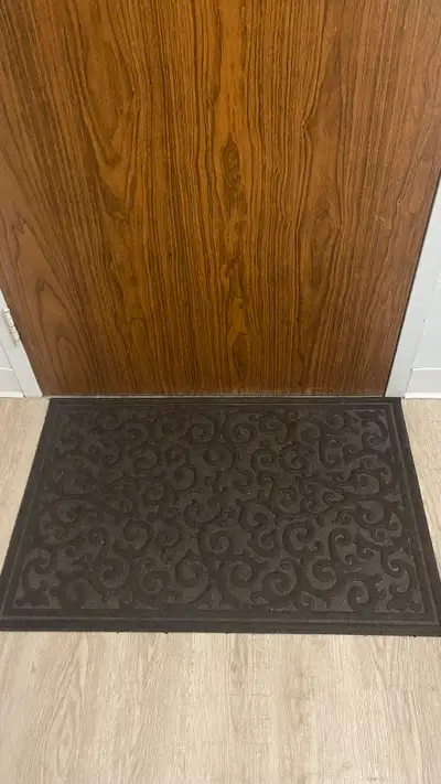 Refresh your doorstep with this stylish black patterned entrance mat, measuring approximately 18x30...
