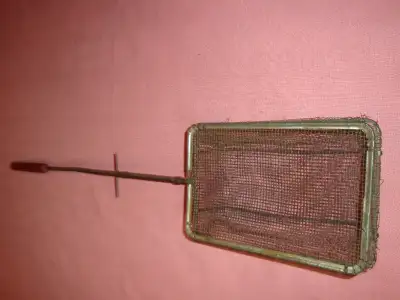 Wire basket popcorn popper was used on the wood burning cook stove in 1950ies. Still useable or put...