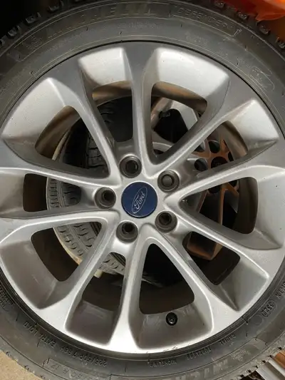 Ford Fusion alloy rims mount on Michelin Defender 2-225/50R 17 88H all season tires in excellence co...