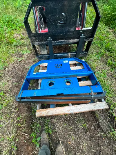 I have two sets of 42” quick connect pallet forks for a track loader/track hoe. These are brand new...