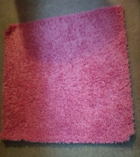 2 small pink ikea rugs