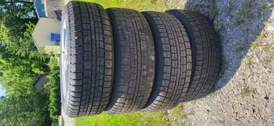 Set of like new tires and rims