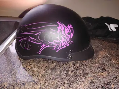 Woman's motorcycle helmet, new with tags, size small. Must pick up.