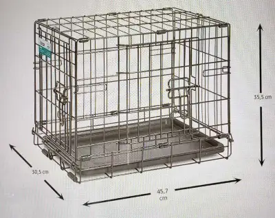 Cette cage iCrate à deux portes est idéale pour les petits chiens ou les chats, offrant un espace sû...