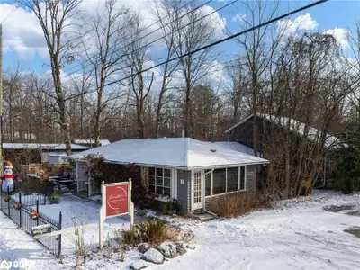 Opportunity Awaits at 73 Big Bay Point Road. This 0.575-acre commercial property, located just minut...