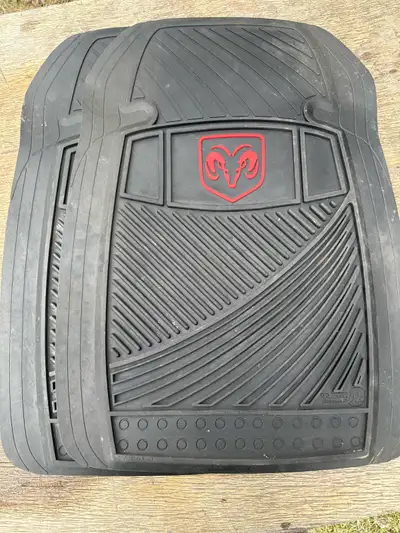 These are Dodge or Ram truck floor mats, perfect for protecting your vehicle's interior from dirt an...