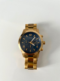 GUESS Women's Gold-Tone Analogue Watch with Navy Blue Dial