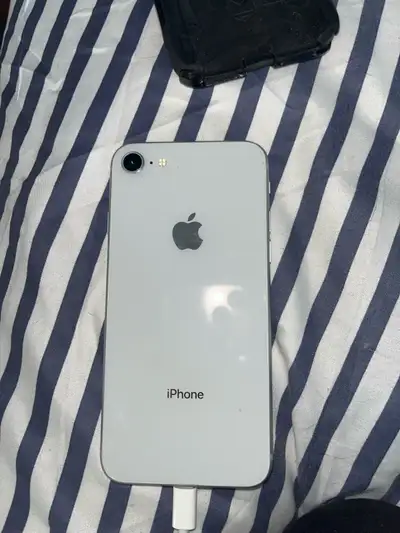 iPhone 8, 256gb of storage, really good phone just upgraded. Screen protector has a crack