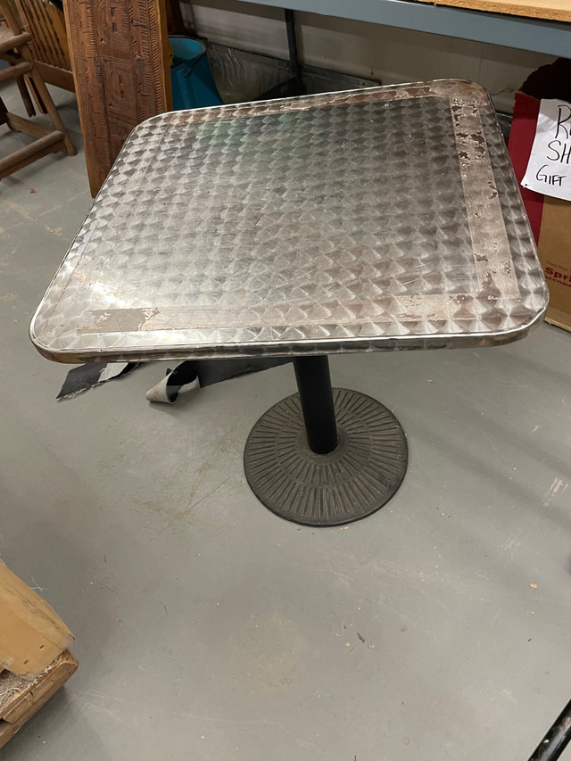 Stainless steel table top w/cast iron base. 2’.3” square 29.5”H in Other Tables in North Bay - Image 2