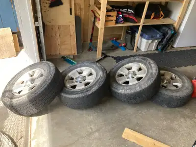 Four 17” Toyota rims with Toyo AT2 all weather tires 265/70/R17. Sweet tires with a couple seasons l...