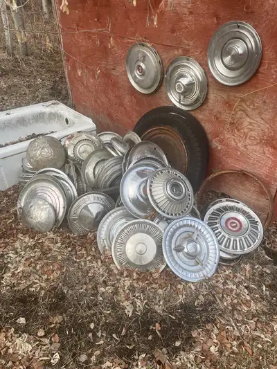 80 wheel covers from 40s 50s 60s ?? Sell as a lot only Phone only 780 984 3570