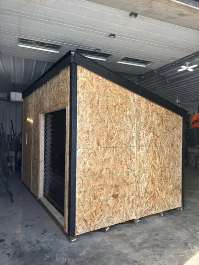 8x12' garden shed Built on 5 - 4x4 treated skids 2x4 wall construction with 7/16" plywood 2x6 lean-t...