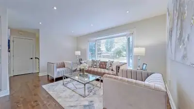 You'd share this beautiful bungalow which features an upgraded eat-in kitchen containing stainless s...