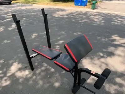 Bench with preacher curl and leg extension. Missing the bar that allows the bench change positions b...