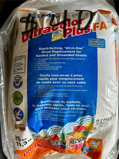 Grey Rapid setting grout Little hole in the bag. Bag has never been opened. Full bag