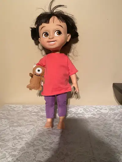 This is a used Disney Monsters Inc. BOO Doll from the Animators Collection, standing 16 inches tall....