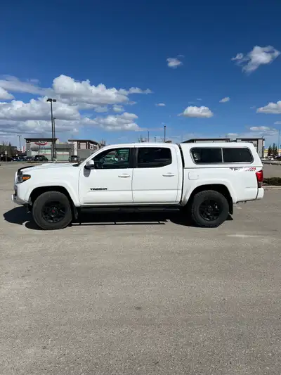 Selling my 2017 Toyota Tacoma TRD Sport with 12100klms. 6 speed manual transmission. Senior owned an...