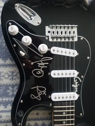 Rob Zombie autographed by the band Electric guitar with authentication papers for sale. Asking 1000....