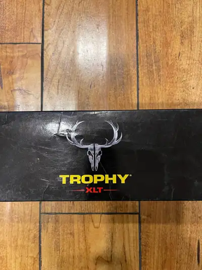 Offering a Trophy XLT rifle scope, designed for precision and clarity in the field. This scope enhan...