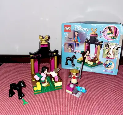 Includes a Mulan mini-doll figure, plus Khan the horse LEGO® figure. Features a family temple, turni...