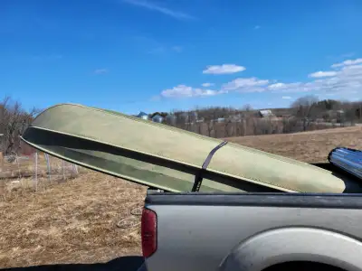 Camo hunting/fishing boat 12 ft. Mercury 5 HP motor low hours. No trailer, can feet truck bed. Price...